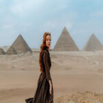 young redhead tourist girl wearing brown